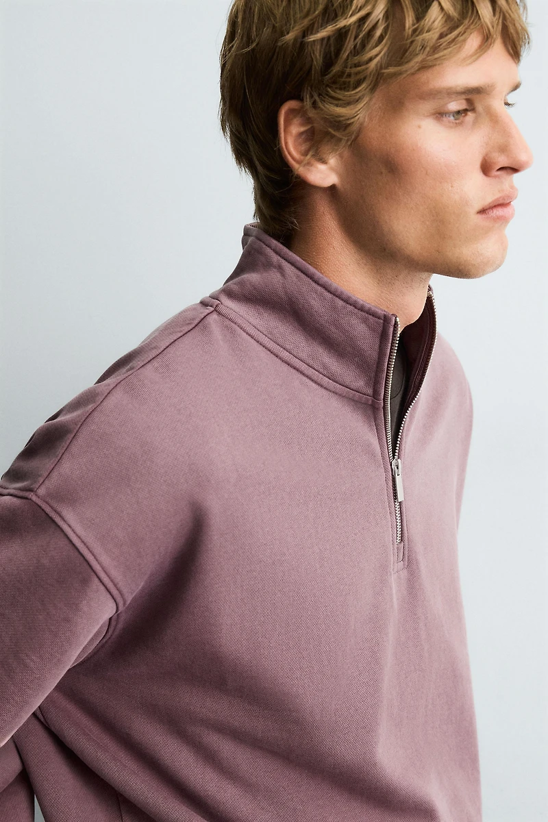SWEAT DÉLAVÉ COL ZIPPÉ
