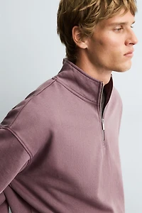 SWEAT DÉLAVÉ COL ZIPPÉ