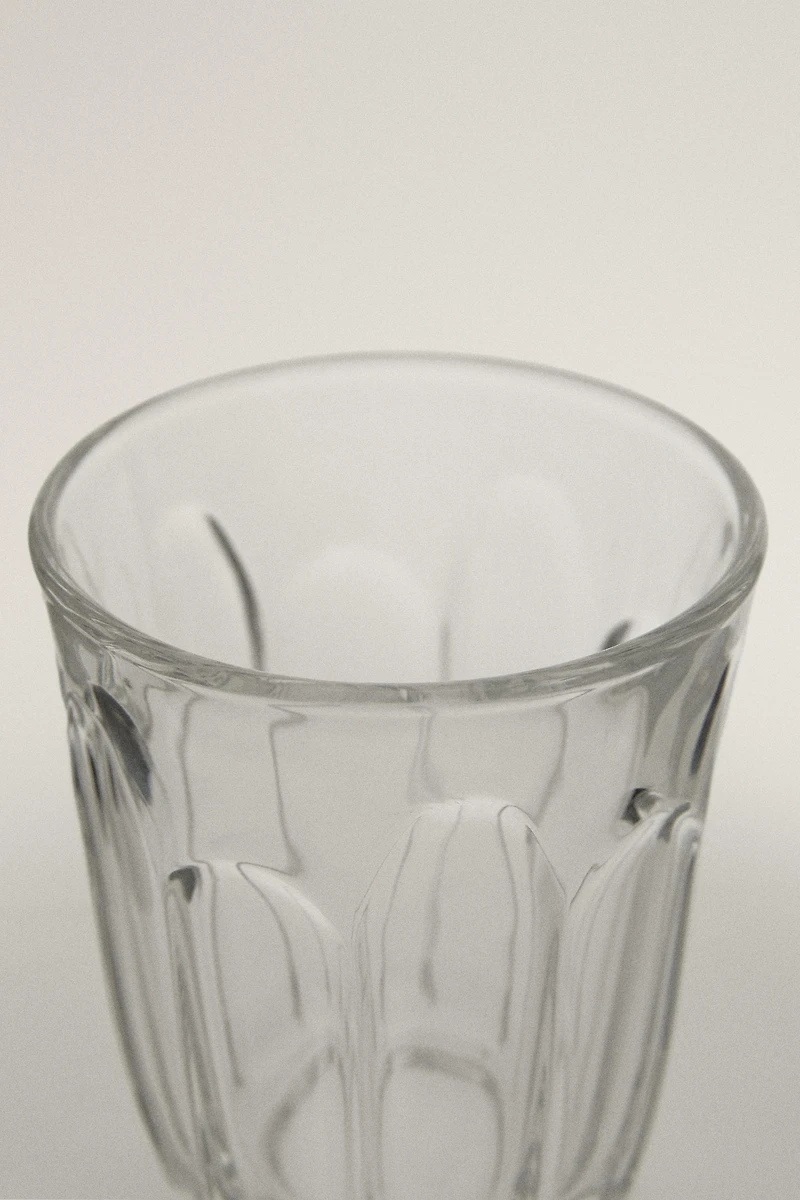 COFFEE TUMBLER WITH RAISED DESIGN