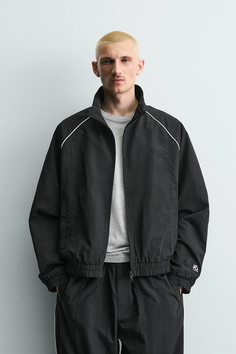 CONTRASTING TECHNICAL JACKET