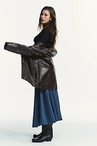 JUPE MI-LONGUE À CARREAUX PLISSÉE