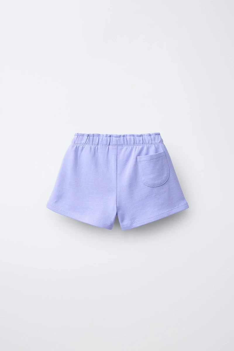 SHORT EN MOLLETON AVEC DÉCOR EFFET GOMME