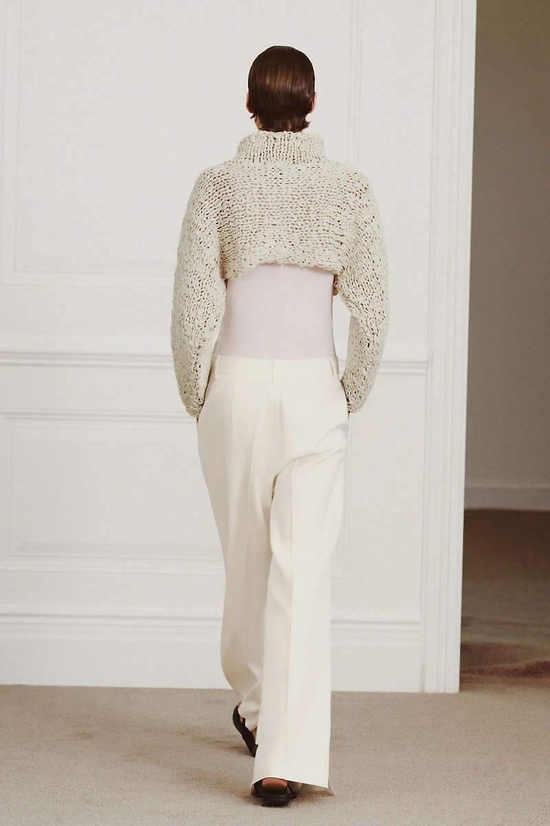 CROPPED KNIT JUMPER WITH INTERTWINED TAPE