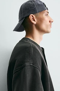 STRUCTURED HENLEY SWEATSHIRT