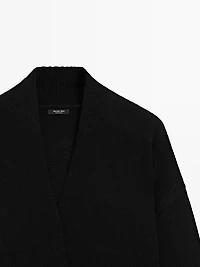 Long knit cardigan with belt