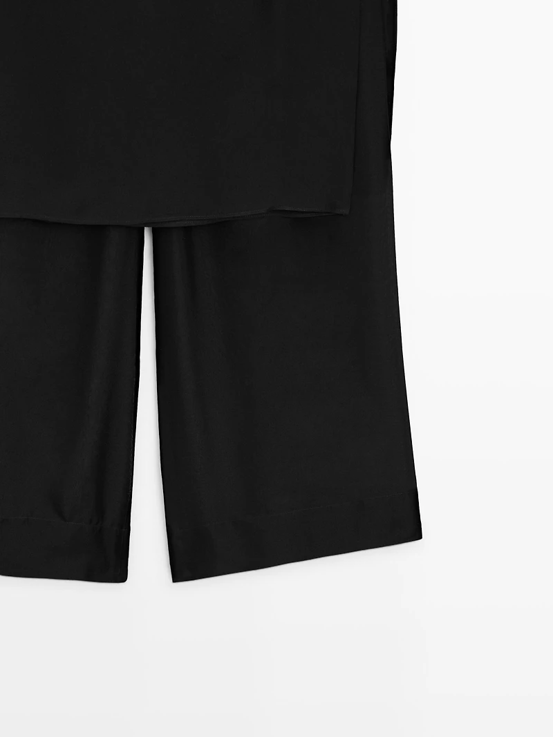 100% silk skirt over trousers