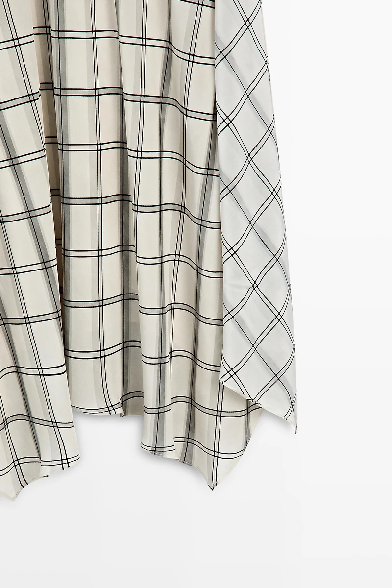 Asymmetric midi skirt with check detail