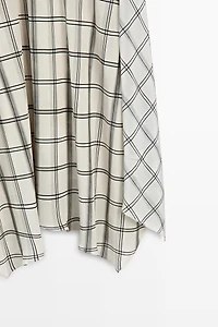 Asymmetric midi skirt with check detail
