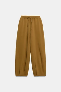 PLEATED TROUSERS