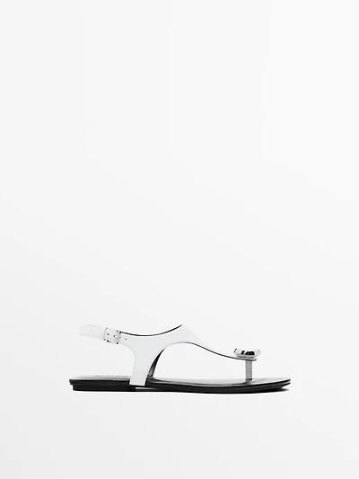 Flat leather sandals with embellished detail