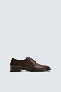 CHAUSSURES HABILLÉES