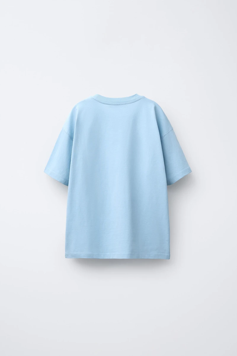 LOT DE TROIS T-SHIRTS À RAYURES ET UNIS