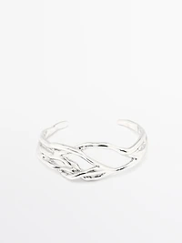 Bracelet métallique abstrait