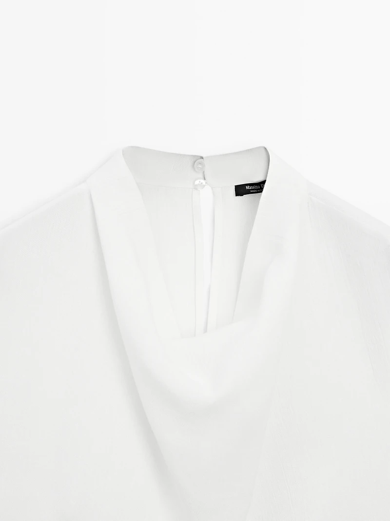 Flowing blouse with draped collar