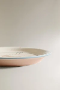 CHILDREN'S CERAMIC SKATING DOG PLATE