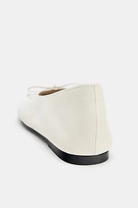 BALLERINES EN CUIR AVEC NŒUD ÉDITION LIMITÉE