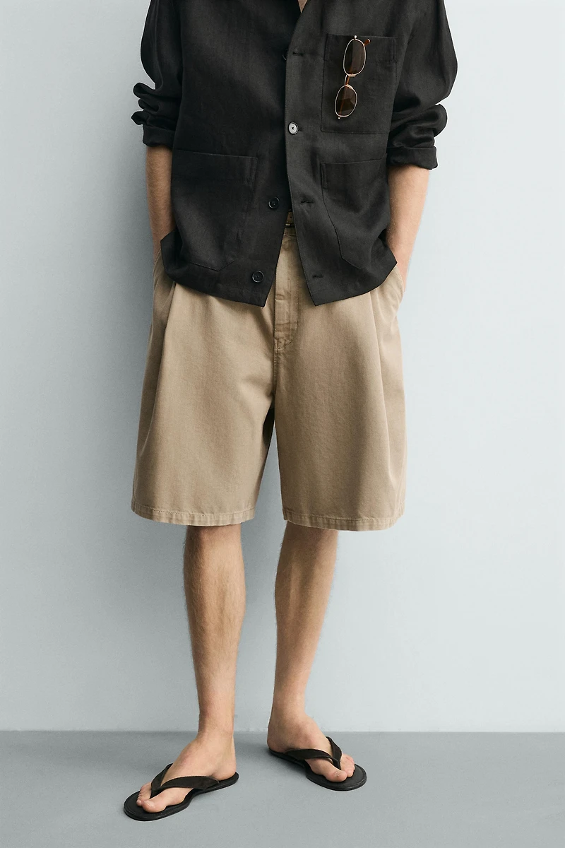 RELAXED FIT PLEATED SHORTS