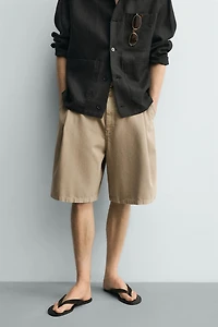 RELAXED FIT PLEATED SHORTS