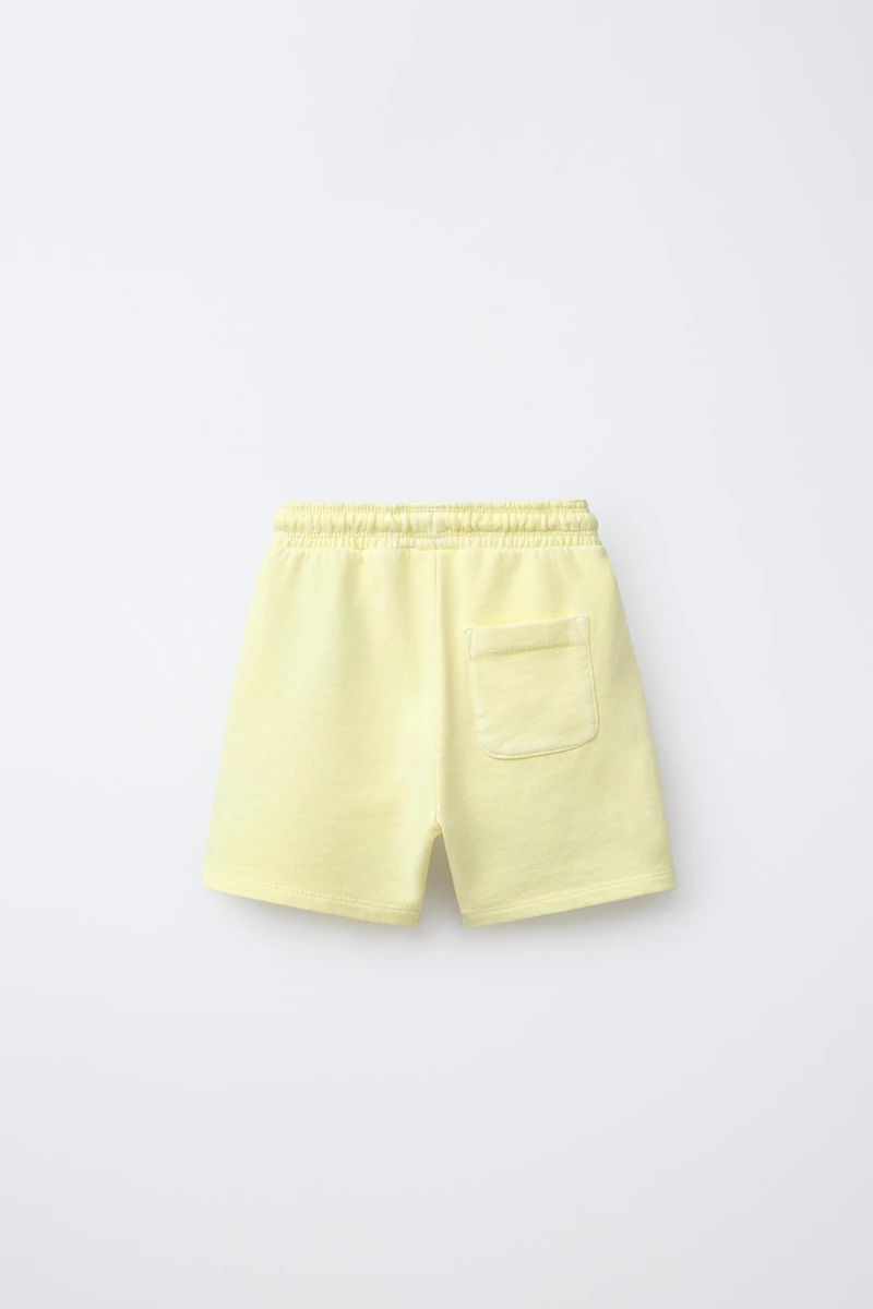 EMBROIDERED GARMENT DYED PLUSH SHORTS