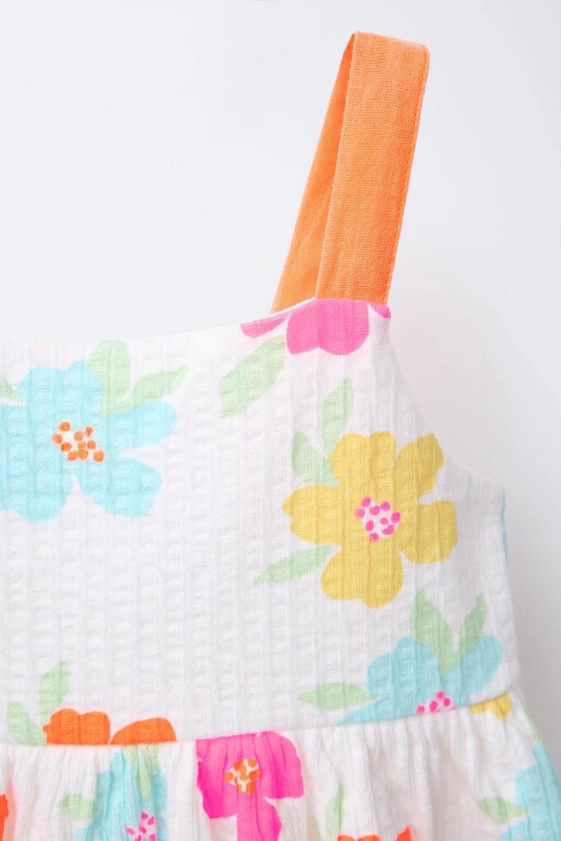 TEXTURED PRINTED BOW DRESS