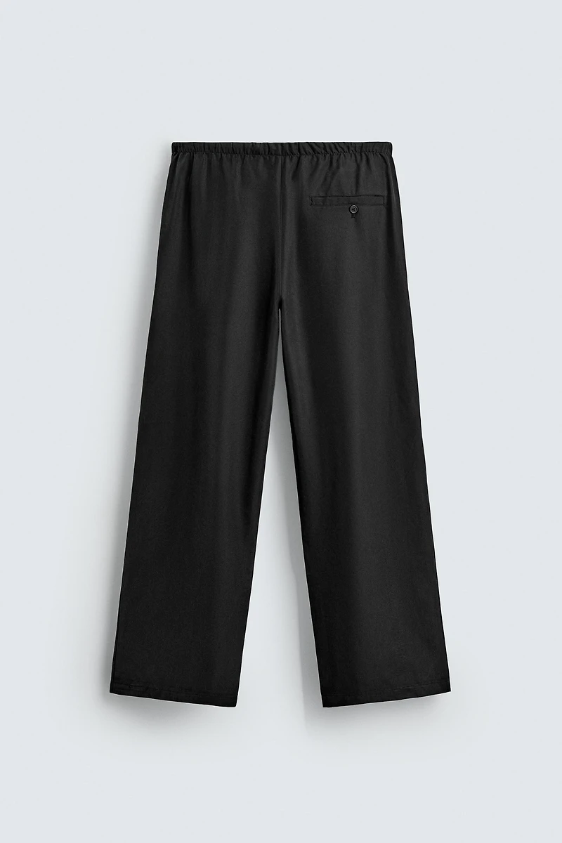 RELAXED FIT FLOWY PANTS