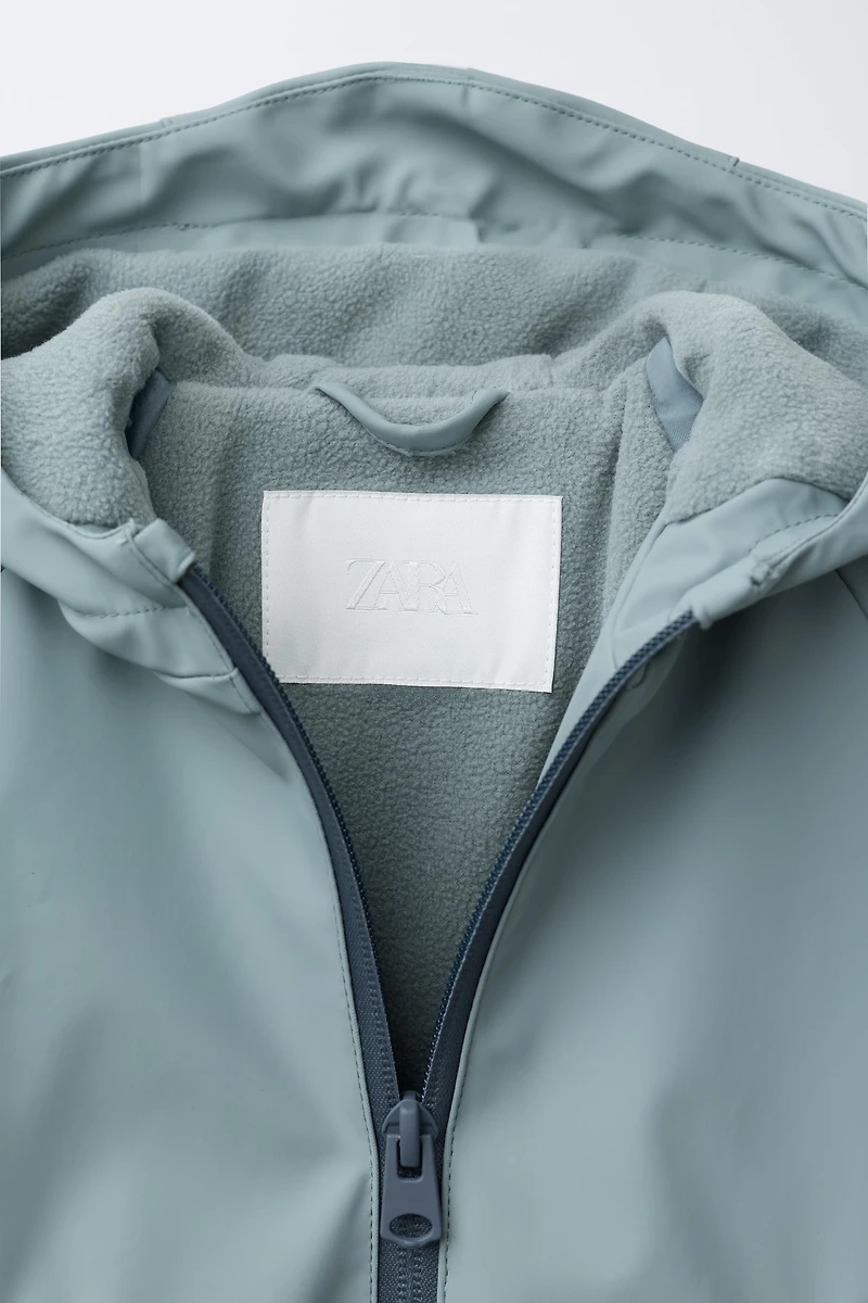 BLOUSON GOMMÉ DÉPERLANT