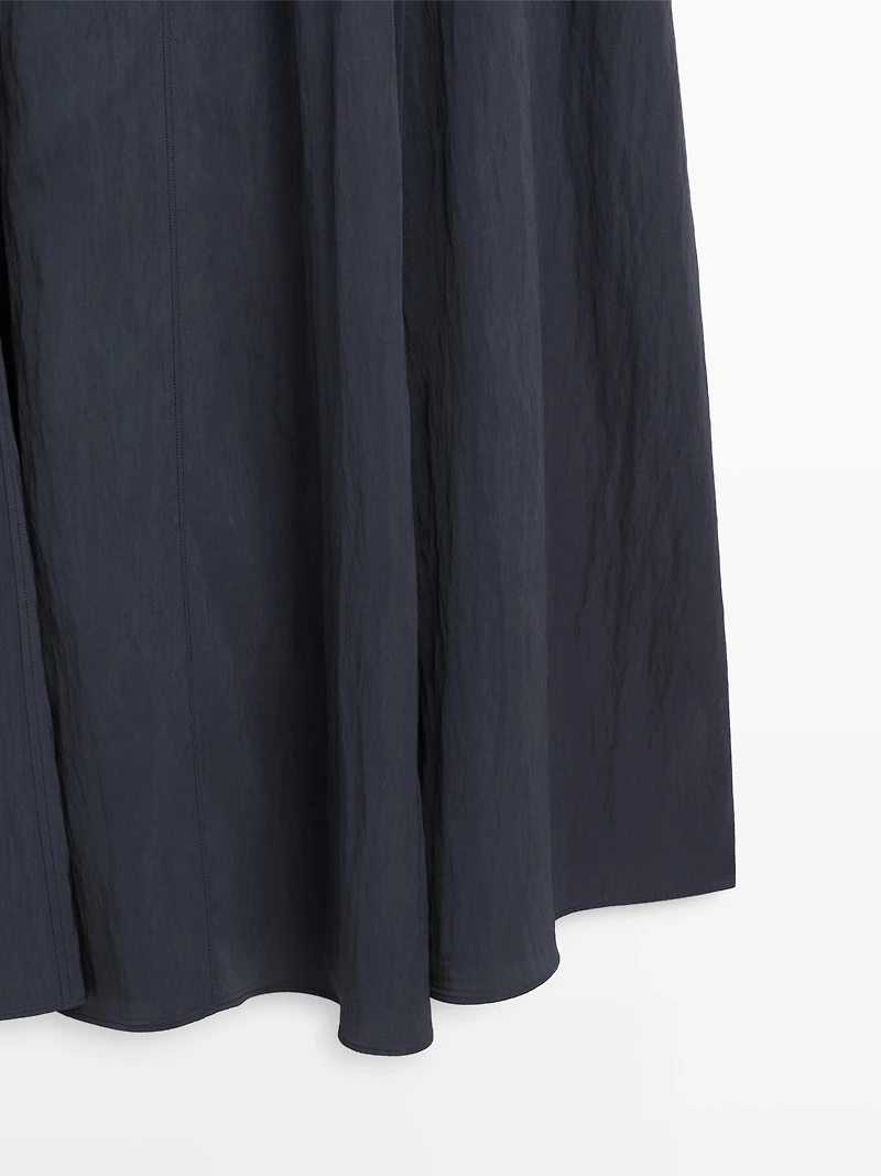 Flowing midi dress with buckles