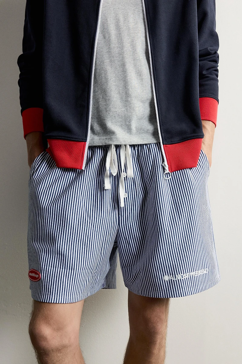 RELAXED FIT STRIPED PATCH BERMUDA SHORTS