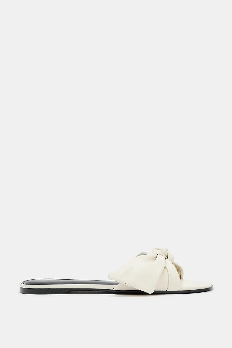 LEATHER BOW FLAT SANDALS