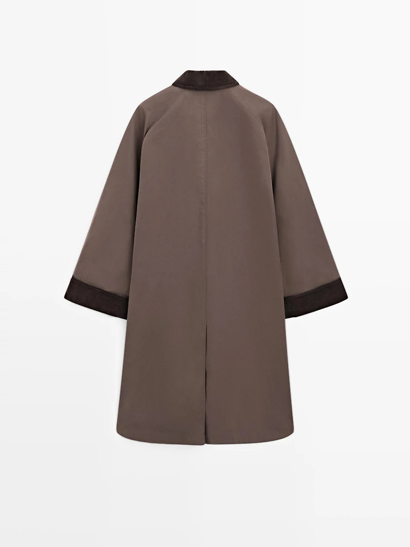 Long waxed parka with corduroy detail