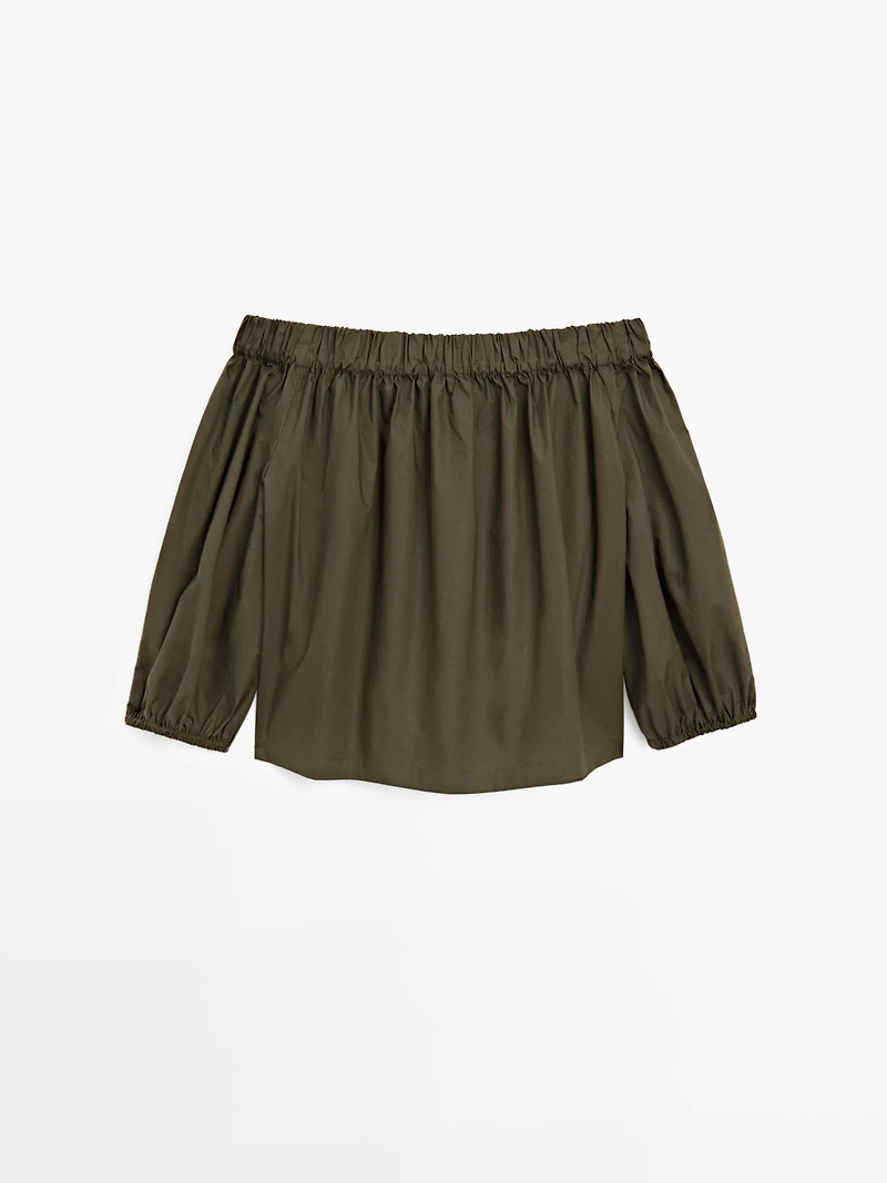 Voluminous boat neck top