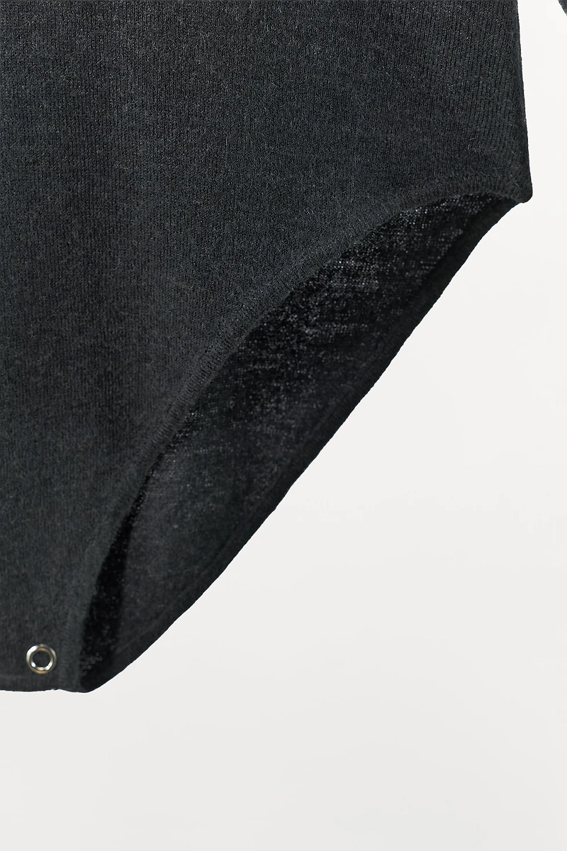 SHOULDER PAD KNIT BODYSUIT