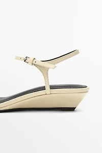 Strappy leather mid-wedge sandals