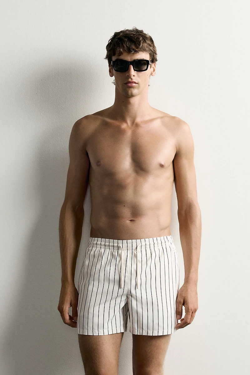 STRIPED MID-LENGTH SWIM TRUNKS