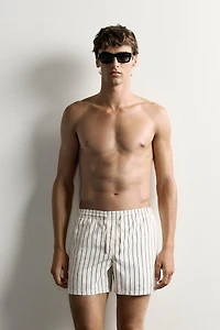 STRIPED MID-LENGTH SWIM TRUNKS