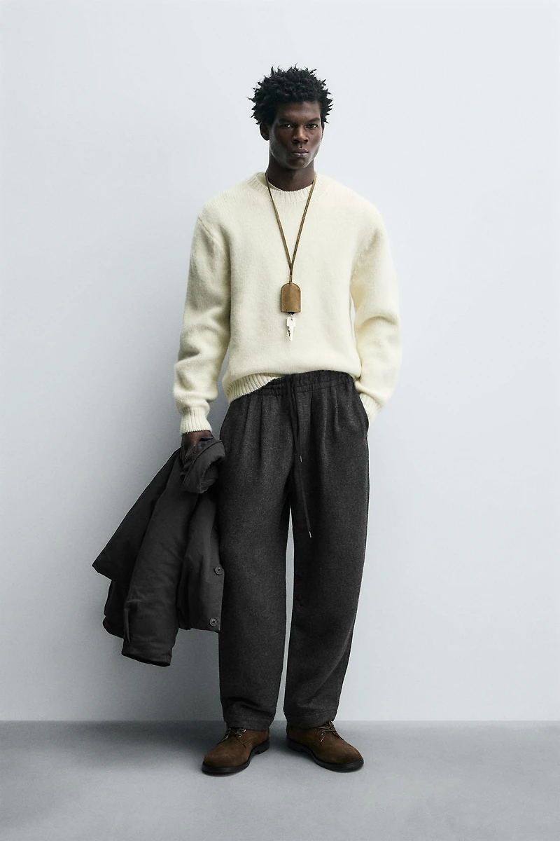 PLEATED WOOL PANTS