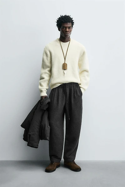 PLEATED WOOL PANTS
