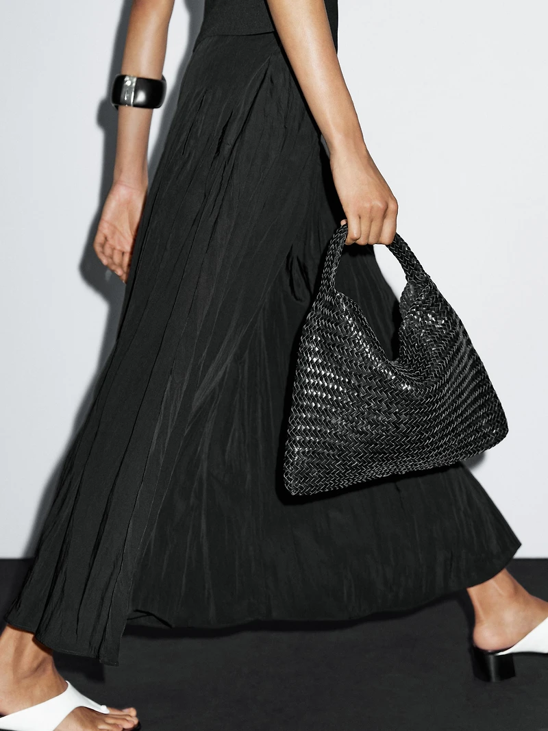 Flowing midi skirt with box pleats