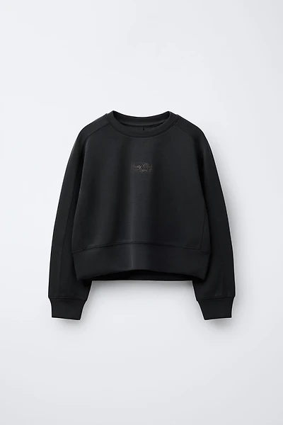 RAISED TEXT SWEATSHIRT