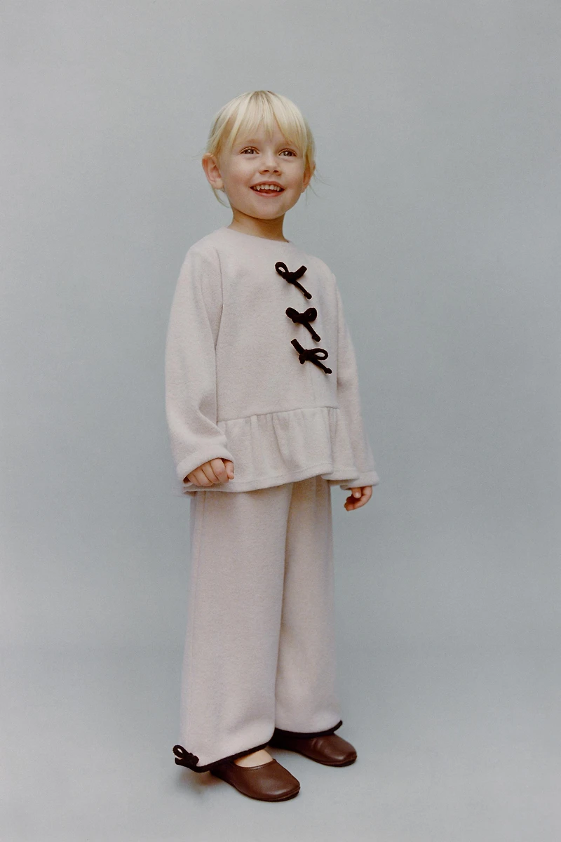 PANTALON JUPE-CULOTTE SOFT TOUCH AVEC DÉCOR NOEUD EN CONTRASTE