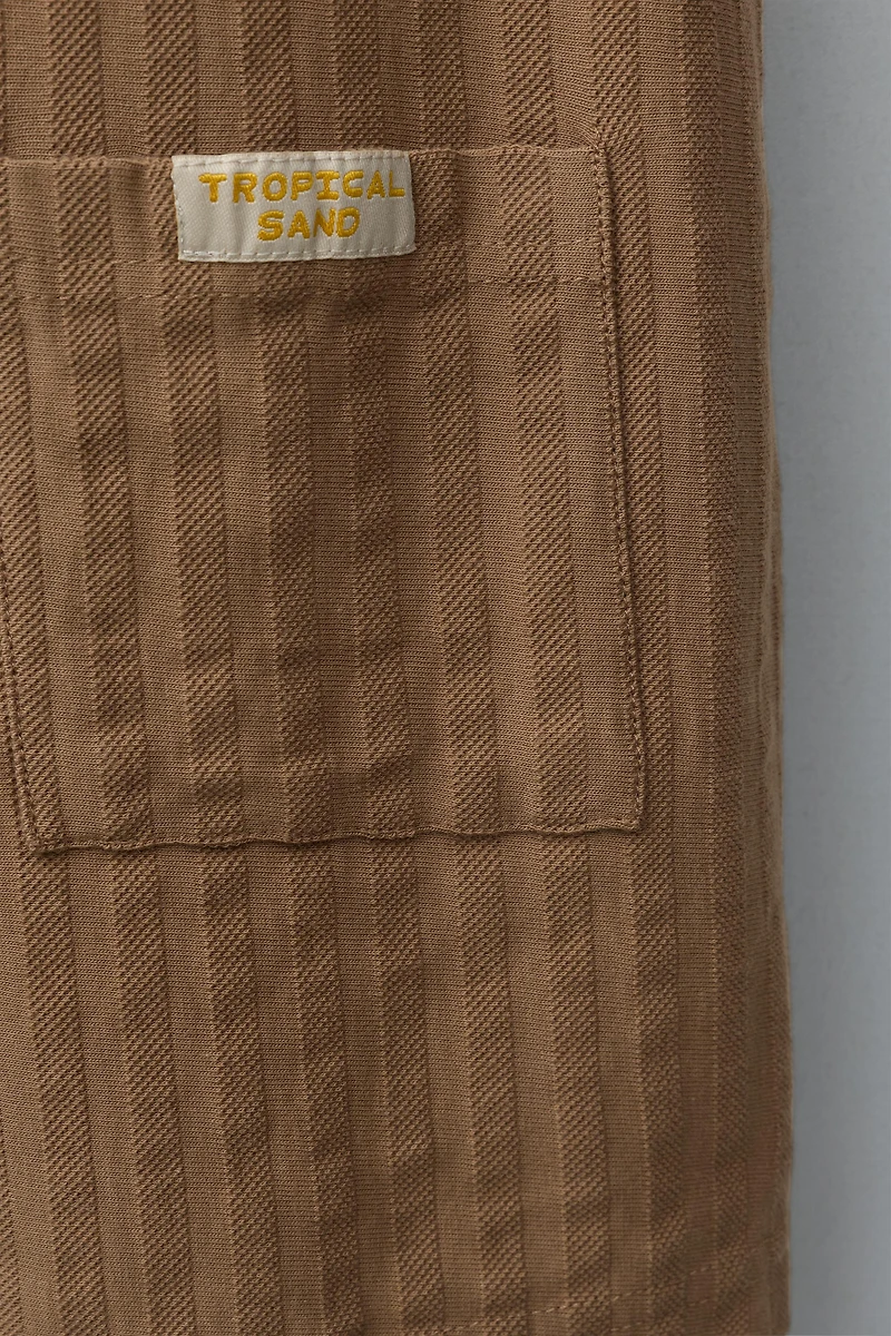 TEXTURED WEAVE SHORT JUMPSUIT