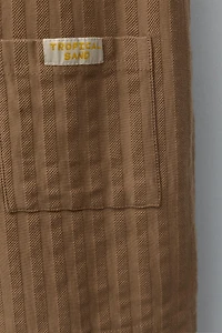 TEXTURED WEAVE SHORT JUMPSUIT