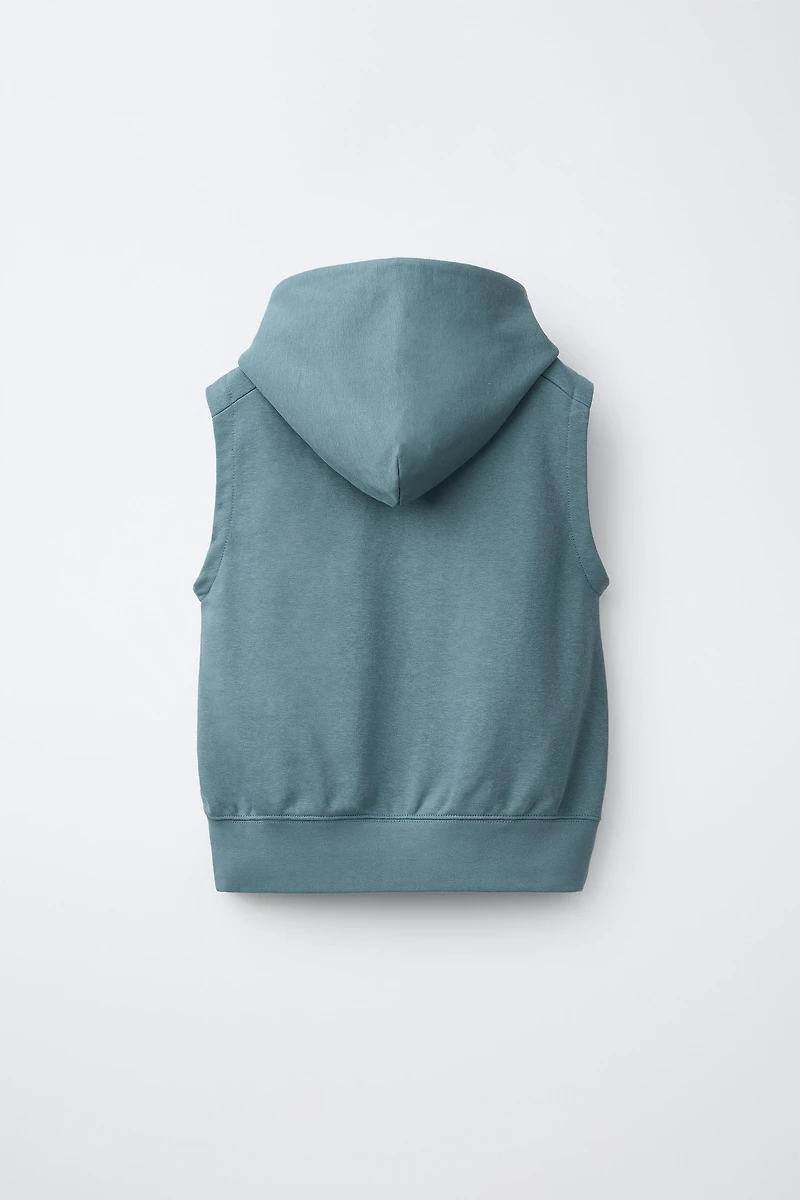 HOODED PLUSH TEXT VEST