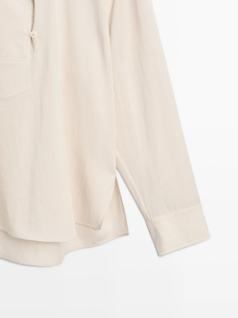 Flowing blouse with button detail