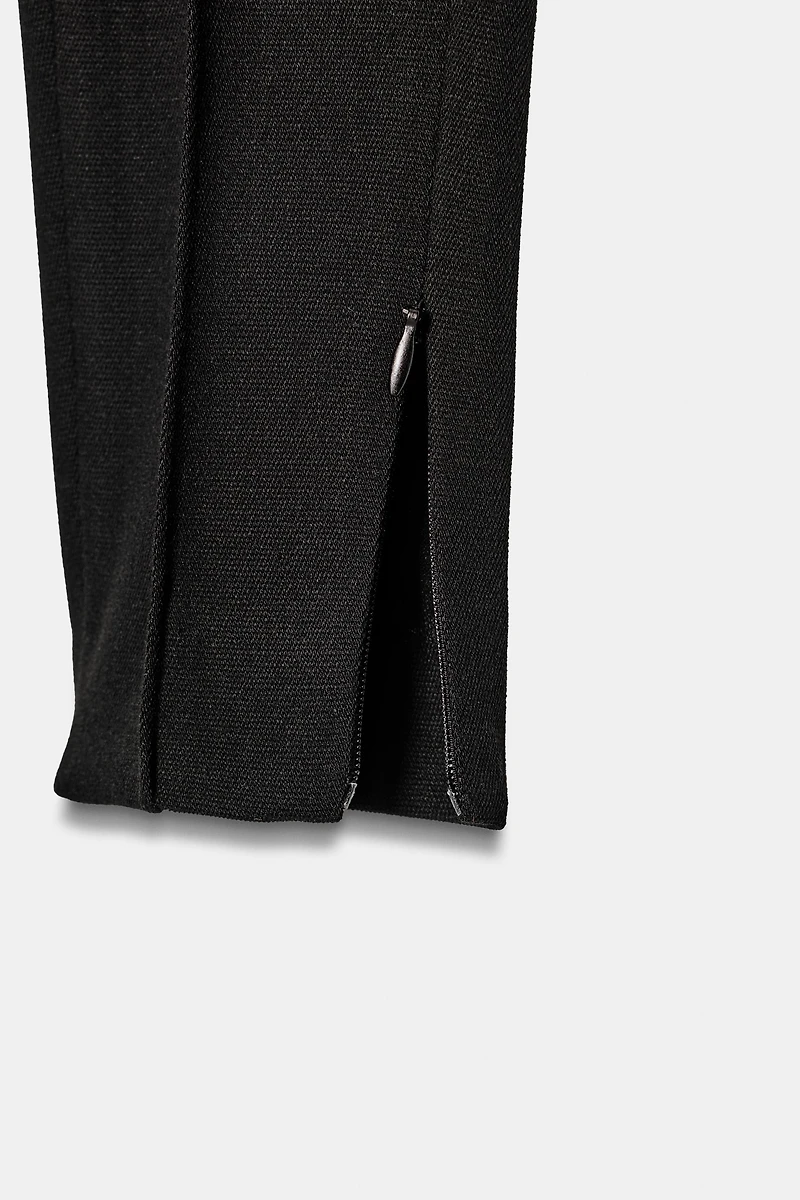 HIGH-WAISTED SLIM PANTS WITH ZIPPER HEM
