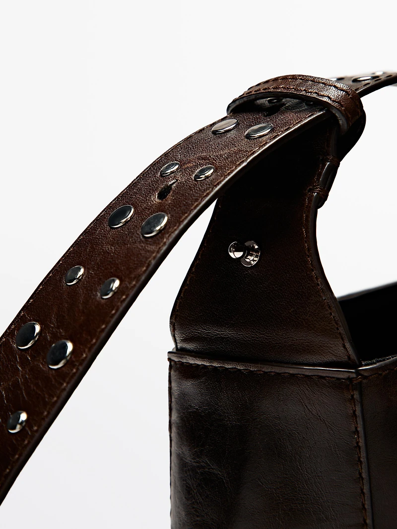 Nappa leather bucket bag with studs