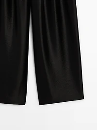 Wide-leg voluminous trousers with darts