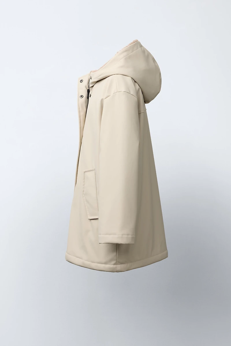 RUBBERIZED WATER RESISTANT FUR EFFECT RAINCOAT