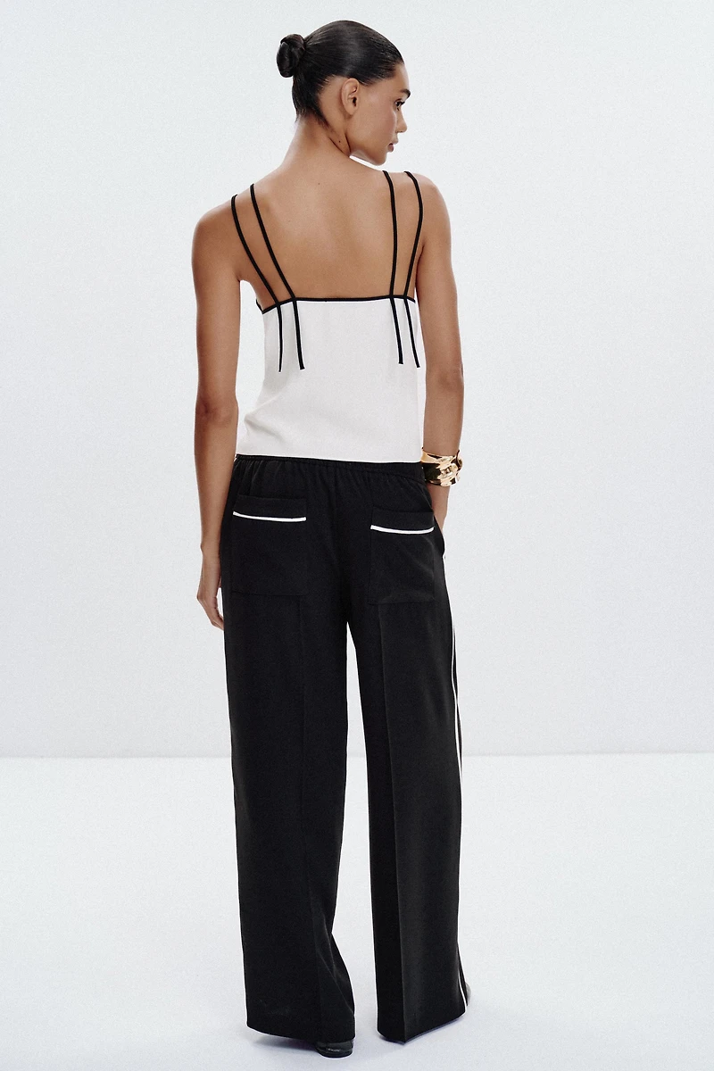CONTRAST PIPED PANTS