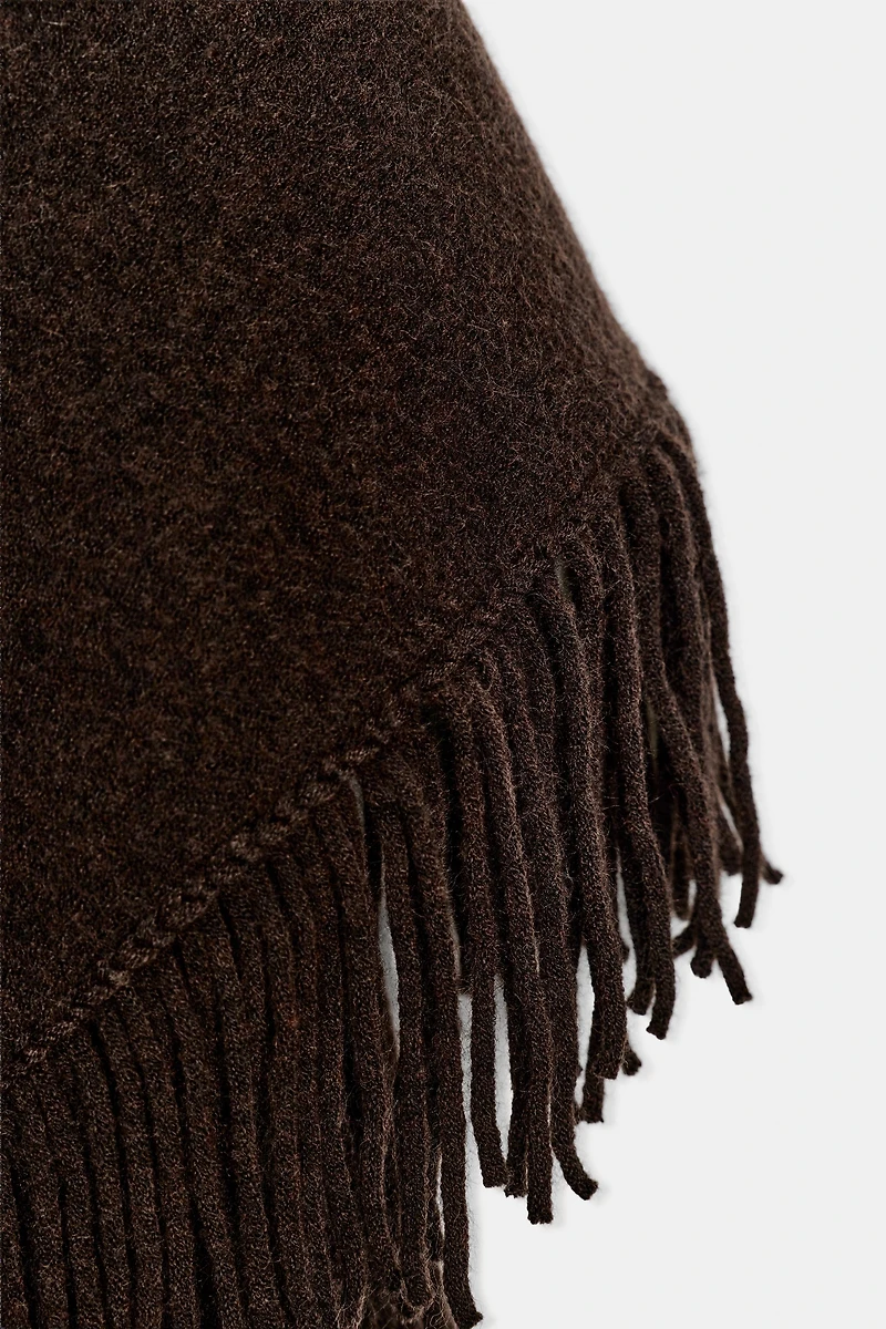 FRINGED KNIT CAPE